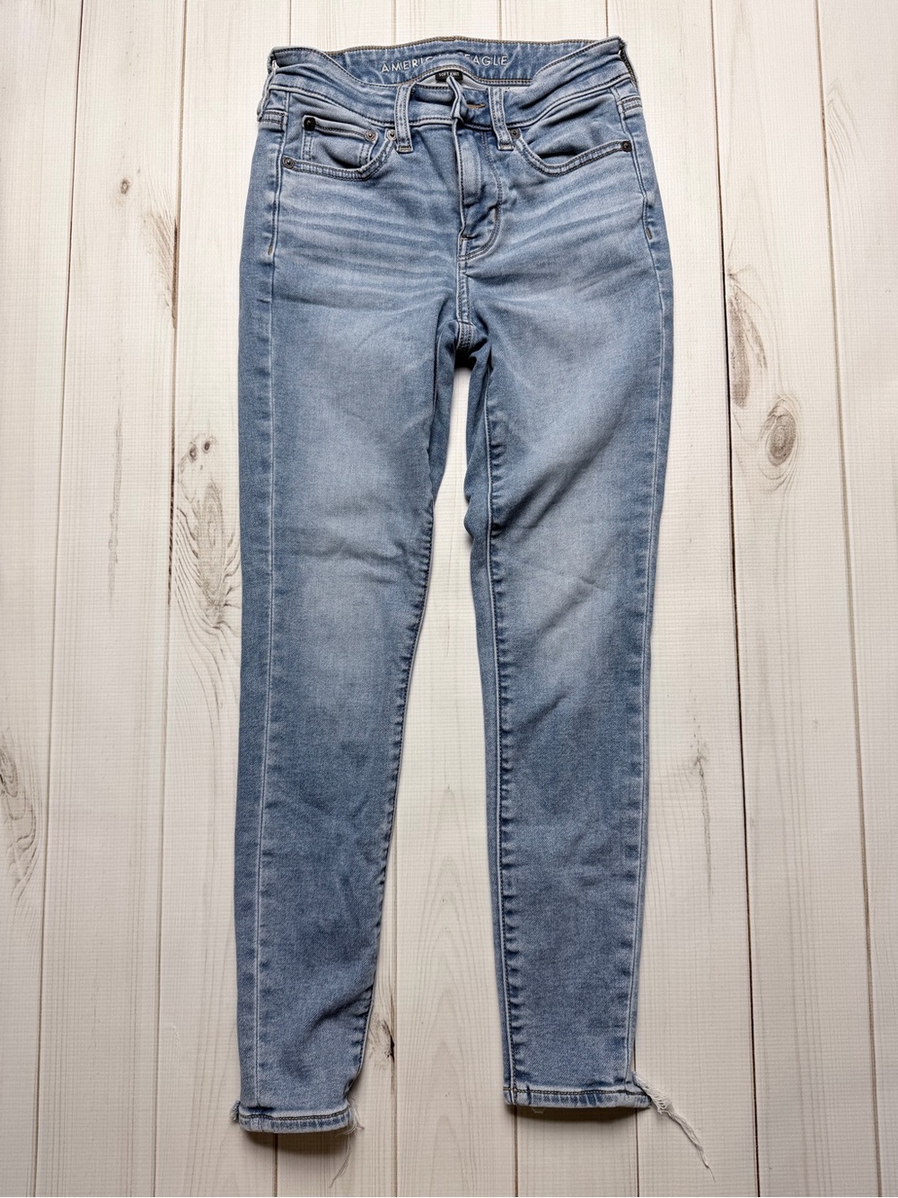 American Eagle Next Level Stretch Skinny Jeans Light Wash Raw Frayed Hem size 0